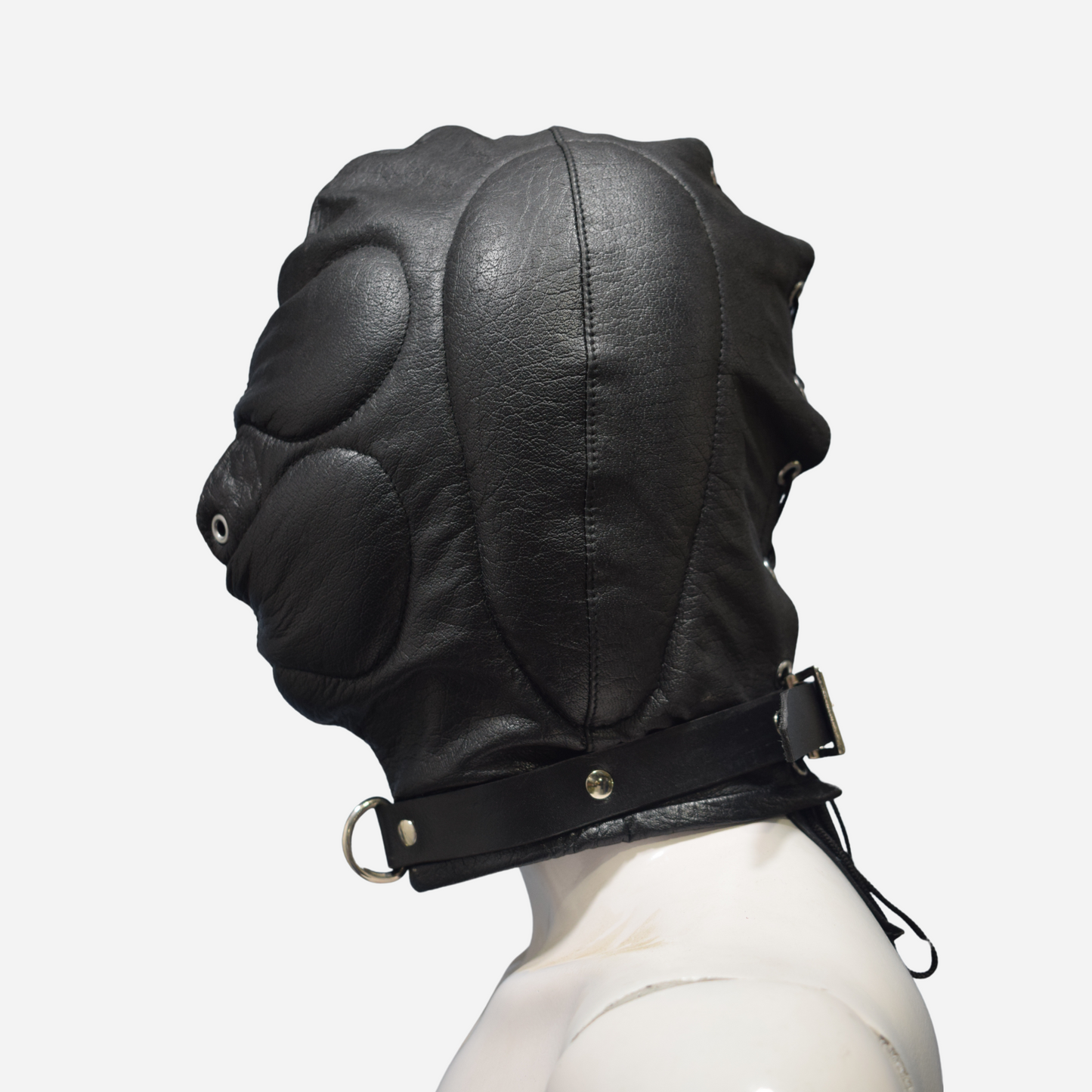 Upgrade your wardrobe with our Premium Genuine Leather Padded Hood. Made from 100% finest quality leather, this stylish black hood features soft padding, adjustable collar with D-ring, lace-up back closure, and double-stitch durability. One size fits all (22" head circumference). Shop now for luxury and comfort!