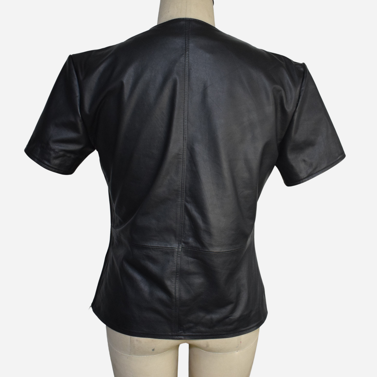 Discover ultimate style with our Men’s Real Leather Mesh T-Shirt. This short sleeve black leather shirt combines premium real leather with modern mesh details for a sleek, breathable design. Perfect for any occasion, this versatile piece elevates your wardrobe with contemporary sophistication. Shop now!"