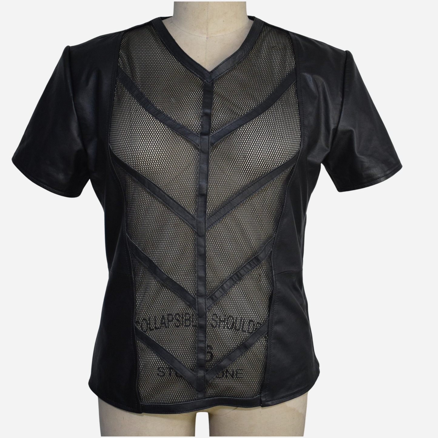 Discover ultimate style with our Men’s Real Leather Mesh T-Shirt. This short sleeve black leather shirt combines premium real leather with modern mesh details for a sleek, breathable design. Perfect for any occasion, this versatile piece elevates your wardrobe with contemporary sophistication. Shop now!"