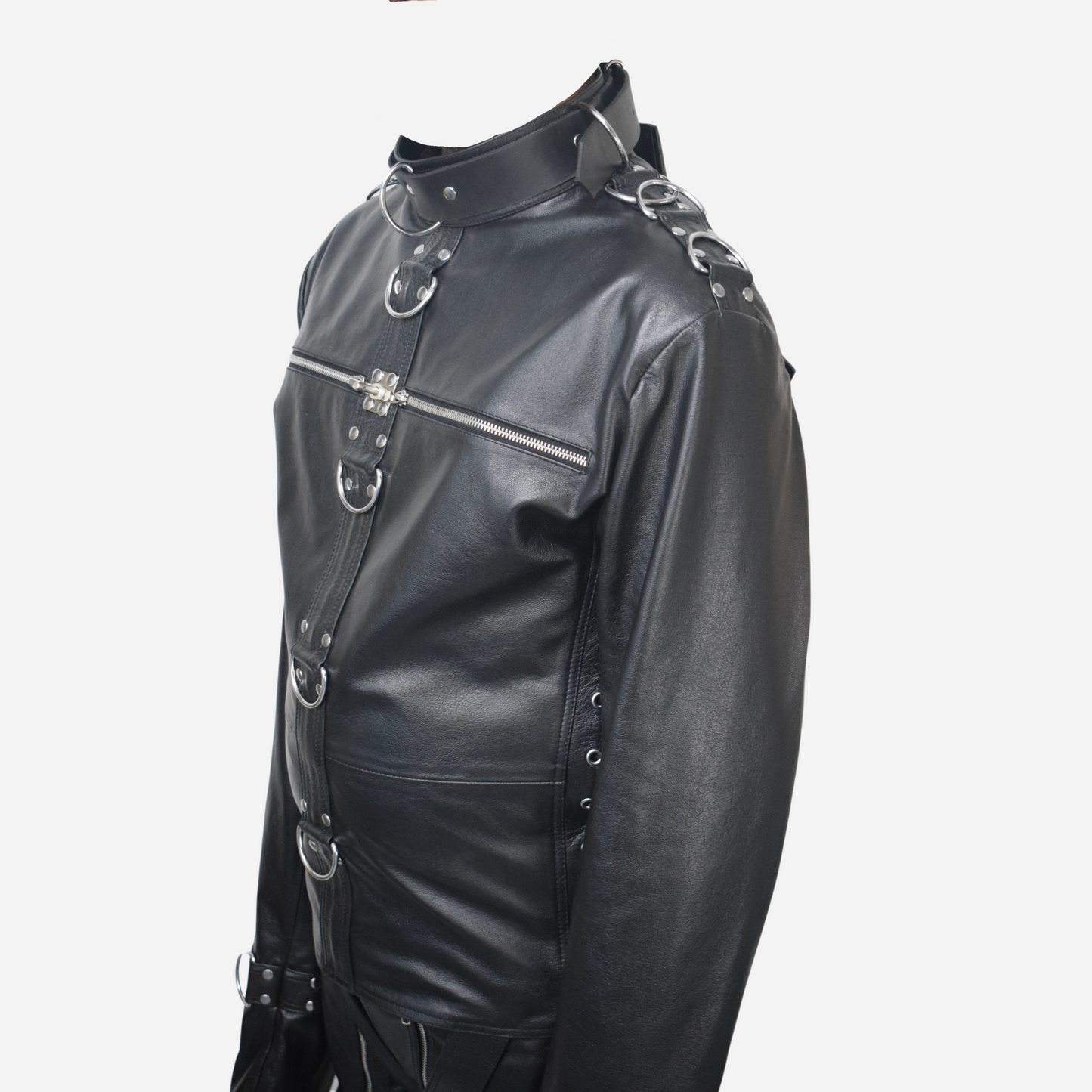 "Shop our premium real leather straightjacket for men, designed for ultimate comfort and durability. With adjustable D-rings, side lacing, and triple back straps, it ensures complete immobilization. Crafted from supple, high-quality leather with riveted straps and double-stitched seams, this handmade jacket offers luxury and long-lasting strength for secure restraint."